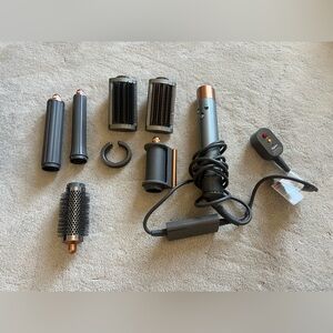 Dyson Gray Power Plug with Red and Yellow Buttons